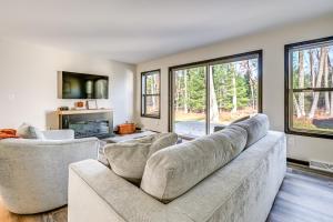 a living room with two couches and a tv at Golf, Hike and Boat Home with Fire Pit in Friendship in Friendship