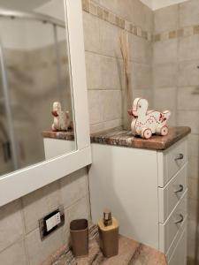 a bathroom with a shower and a counter with a sink at Casa Elvezia in Breuil-Cervinia