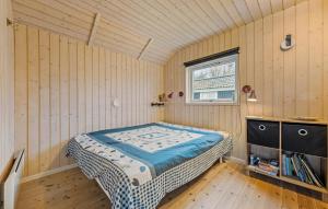 a bedroom with a bed in a room with a window at Beautiful Home In Gørlev With Wifi in Gørlev