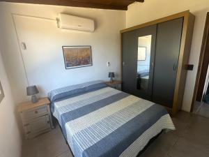 Ένα ή περισσότερα κρεβάτια σε δωμάτιο στο Casas Las Covachas 1, Barra del Chuy, cerca del mar