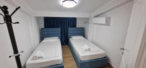 Postel nebo postele na pokoji v ubytování Apartment Elbasan city center 2