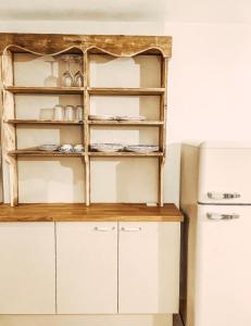 Kuchyň nebo kuchyňský kout v ubytování Le cottage bohème