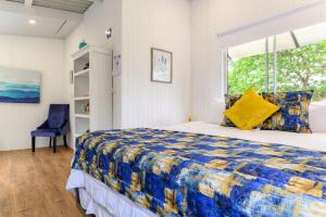 Postel nebo postele na pokoji v ubytování Blue Morpho Lodge