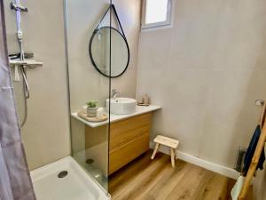 a bathroom with a sink and a mirror at St Martial Sète centre, CLIM in Sète +7 photos