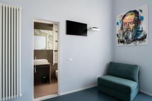 TV a/nebo společenská místnost v ubytování Ammodino my Tuscany home