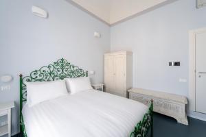 Postel nebo postele na pokoji v ubytování Ammodino my Tuscany home