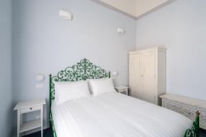 Postel nebo postele na pokoji v ubytování Ammodino my Tuscany home