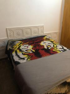 Ένα ή περισσότερα κρεβάτια σε δωμάτιο στο La Chiquitita