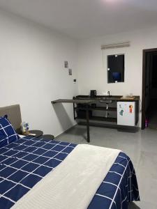 TV a/nebo společenská místnost v ubytování Pousada Tamatoa