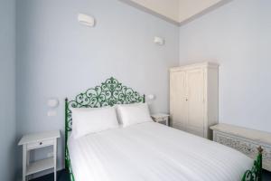 Postel nebo postele na pokoji v ubytování Ammodino my Tuscany home