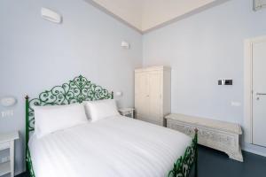 Postel nebo postele na pokoji v ubytování Ammodino my Tuscany home