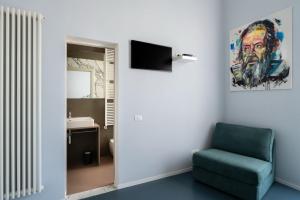 TV a/nebo společenská místnost v ubytování Ammodino my Tuscany home