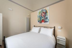 Postel nebo postele na pokoji v ubytování Ammodino my Tuscany home