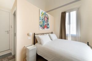Postel nebo postele na pokoji v ubytování Ammodino my Tuscany home