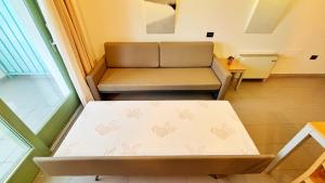 Khu vực ghế ngồi tại Appartamento Villaggio Olimpico Sestriere
