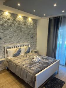 Postel nebo postele na pokoji v ubytování New House