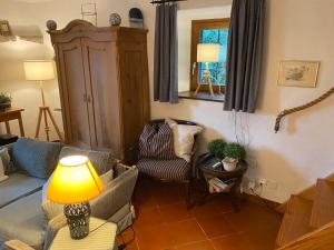 Area soggiorno di Rustico Gatto by Fewotessin