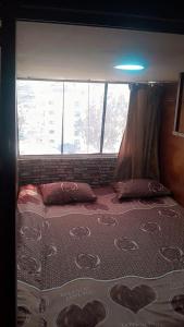 Una cama o camas en una habitación de Petra inbox Hostel