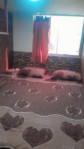 Una cama o camas en una habitación de Petra inbox Hostel