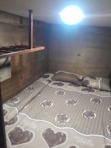 Una cama o camas en una habitación de Petra inbox Hostel