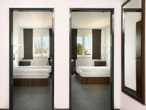 Koupelna v ubytování Hotel Fabrik Vösendorf