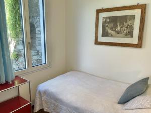 Postel nebo postele na pokoji v ubytování Casa Pipistrello by Fewotessin