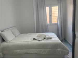 Voodi või voodid majutusasutuse Apartment in martil toas