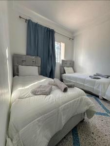 Postel nebo postele na pokoji v ubytování Apartment in martil