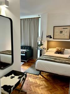 Postel nebo postele na pokoji v ubytování Niko Rooms