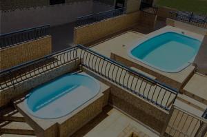Bazén v ubytování Hotel Plaza Lampião nebo v jeho okolí