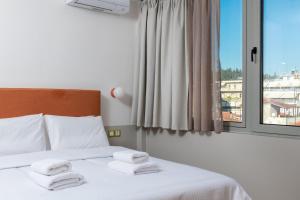 Voodi või voodid majutusasutuse Sleep On It toas