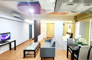 Μια τηλεόραση ή/και κέντρο ψυχαγωγίας στο Holiday Hostel KLCC +5 φωτογραφίες