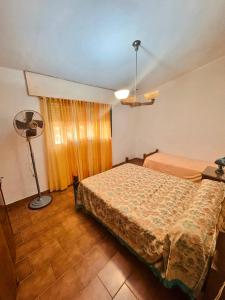 Ένα ή περισσότερα κρεβάτια σε δωμάτιο στο Casa el zorzal Agua de oro