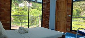 Balkón nebo terasa v ubytování Eco-HOTEL HOGAR EN LA MONTAÑA HOME SWEET HOME