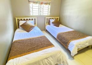 Postel nebo postele na pokoji v ubytování Tiny House Dferry With Private Pool OR 4 Room Homestay Jerantut Wifi Full Aircond