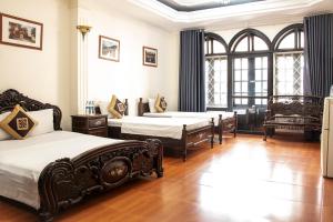 Ένα ή περισσότερα κρεβάτια σε δωμάτιο στο HomeTown Cha Hotel