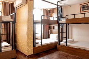Ένα ή περισσότερα κρεβάτια σε δωμάτιο στο HomeTown Cha Hotel