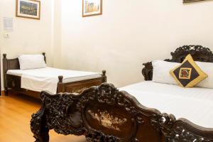 Ένα ή περισσότερα κρεβάτια σε δωμάτιο στο HomeTown Cha Hotel