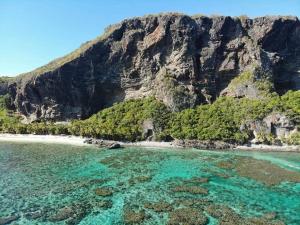 a view of a beach with turquoise water at Atabeba in Las Galeras