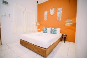 Postel nebo postele na pokoji v ubytování LiLLA Rainforest Retreat - Hulu Langat
