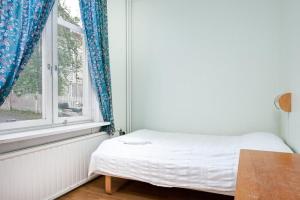 Postel nebo postele na pokoji v ubytování Pensionat Svea