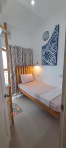 Postel nebo postele na pokoji v ubytování Gomez Guest House + 37 fotografií