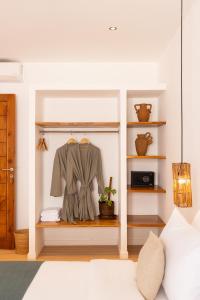 Katil atau katil-katil dalam bilik di Sikara Lombok Hotel
