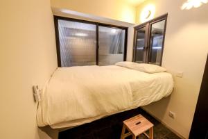 Tempat tidur dalam kamar di Relax APT for Max Comfort Best View in CBD BSD