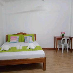 Ένα ή περισσότερα κρεβάτια σε δωμάτιο στο Benson's Place