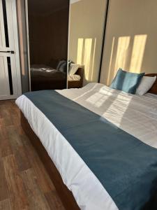 Postel nebo postele na pokoji v ubytování Ayan Hotel