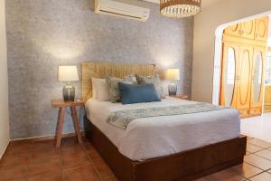 Ένα ή περισσότερα κρεβάτια σε δωμάτιο στο Casa Mar