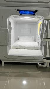 Fotografie z fotogalerie ubytování Kiwi Capsule Hotel v destinaci Bangkok + 37 fotografií