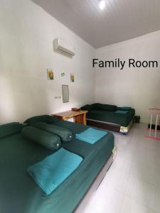 Ein Sitzbereich in der Unterkunft AAL Homestay