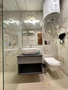 Ένα μπάνιο στο Luxe Haven Residency